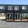 2-storey prefabricated shipping container villa with a terrace