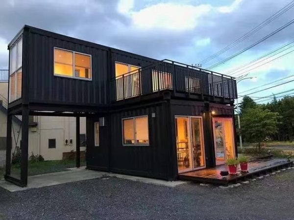 2-storey prefab shipping container home with a terrace